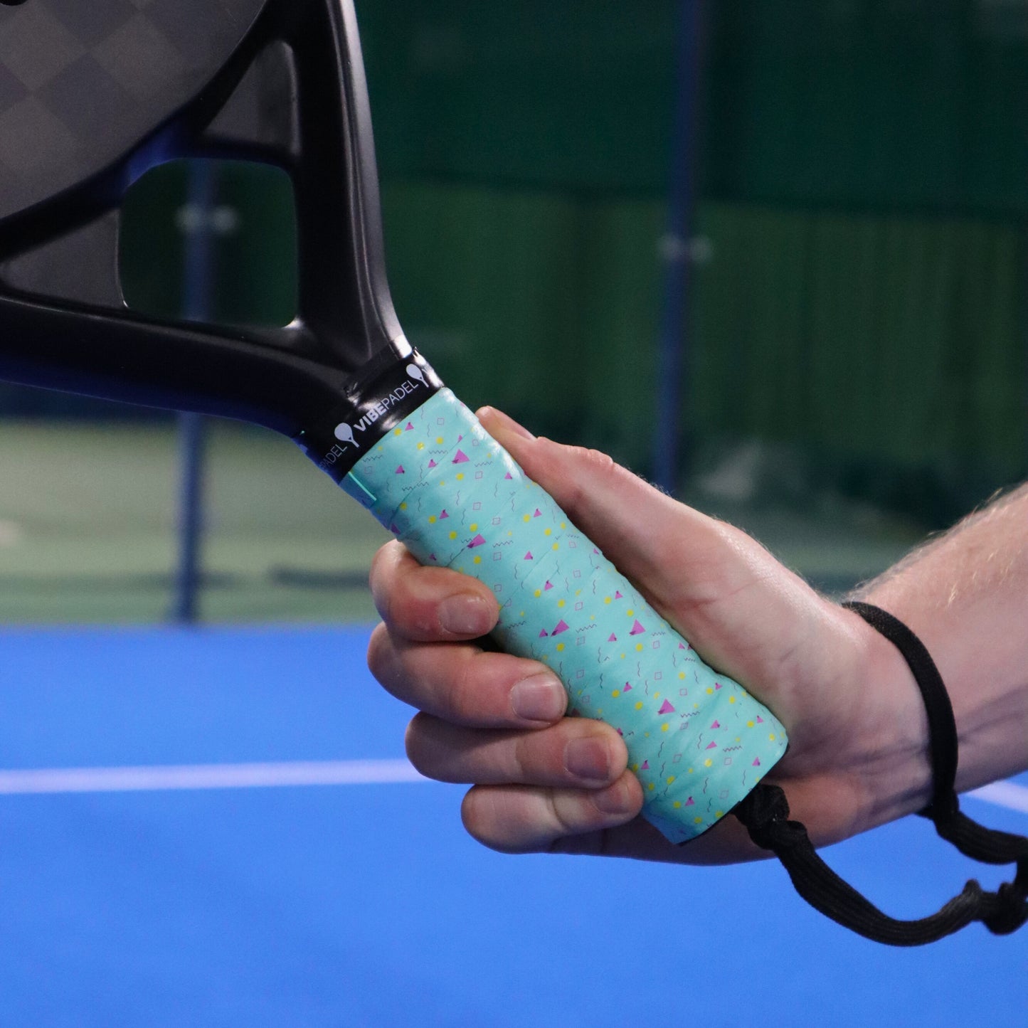 Green Retro VIBEPADEL Grip n Rip Padel Racket Overgrip on Padel Court