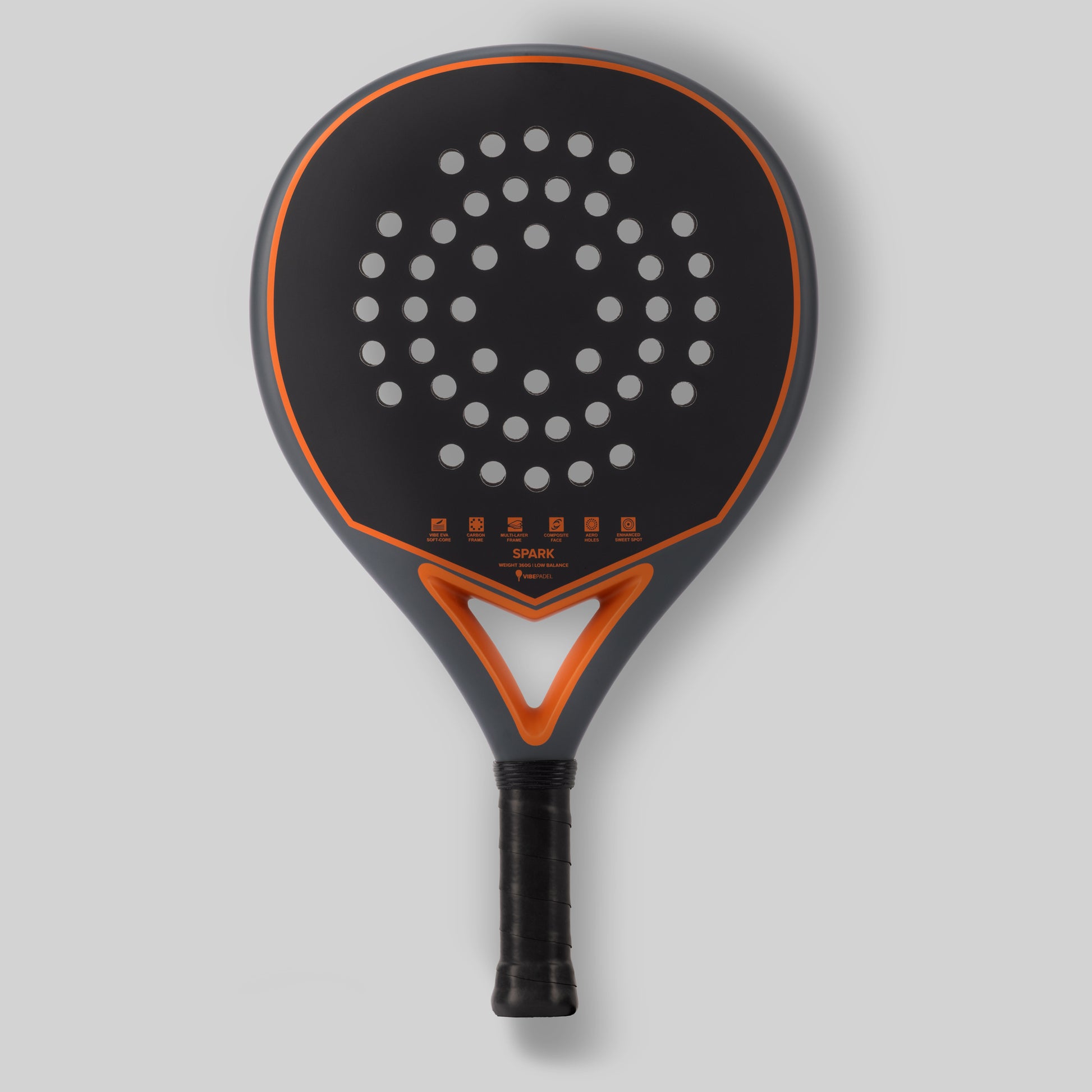 Padel VIBEPADEL racket with black and orange design on a gray background
